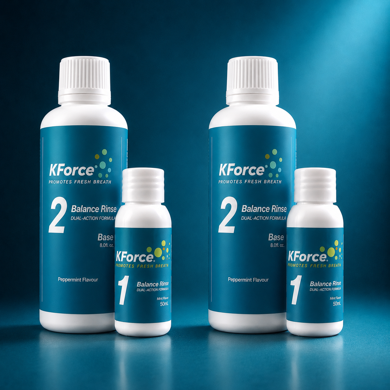Four white plastic bottles of KForce Balance Rinse arranged on a dark blue gradient background. The set includes two large bottles (labeled 2) and two small bottles (labeled 1) in peppermint flavor.